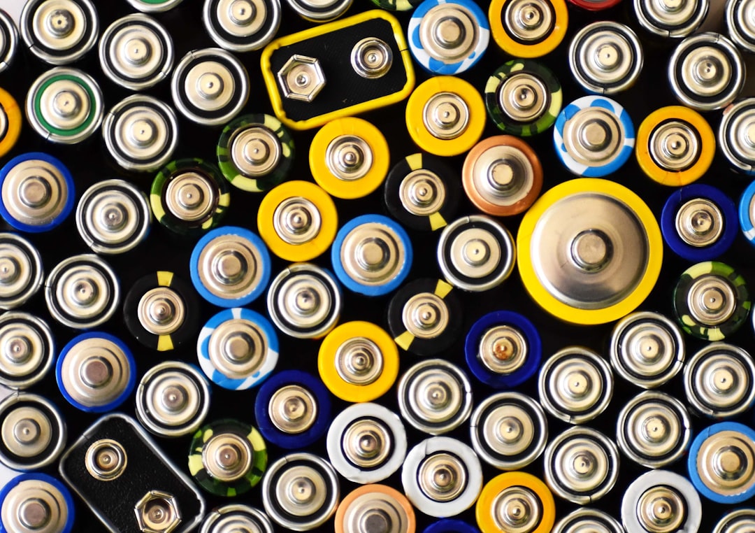 photo with stylus batteries piled up with anode exposed